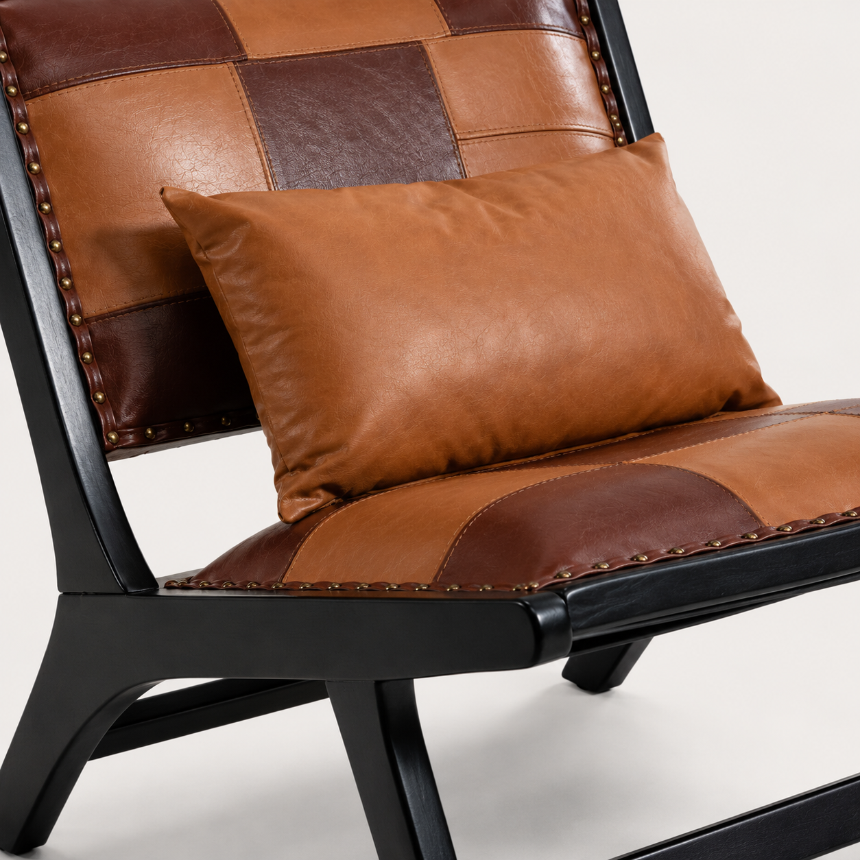 Cognac espresso leather patchwork nailhead trim close-up detail