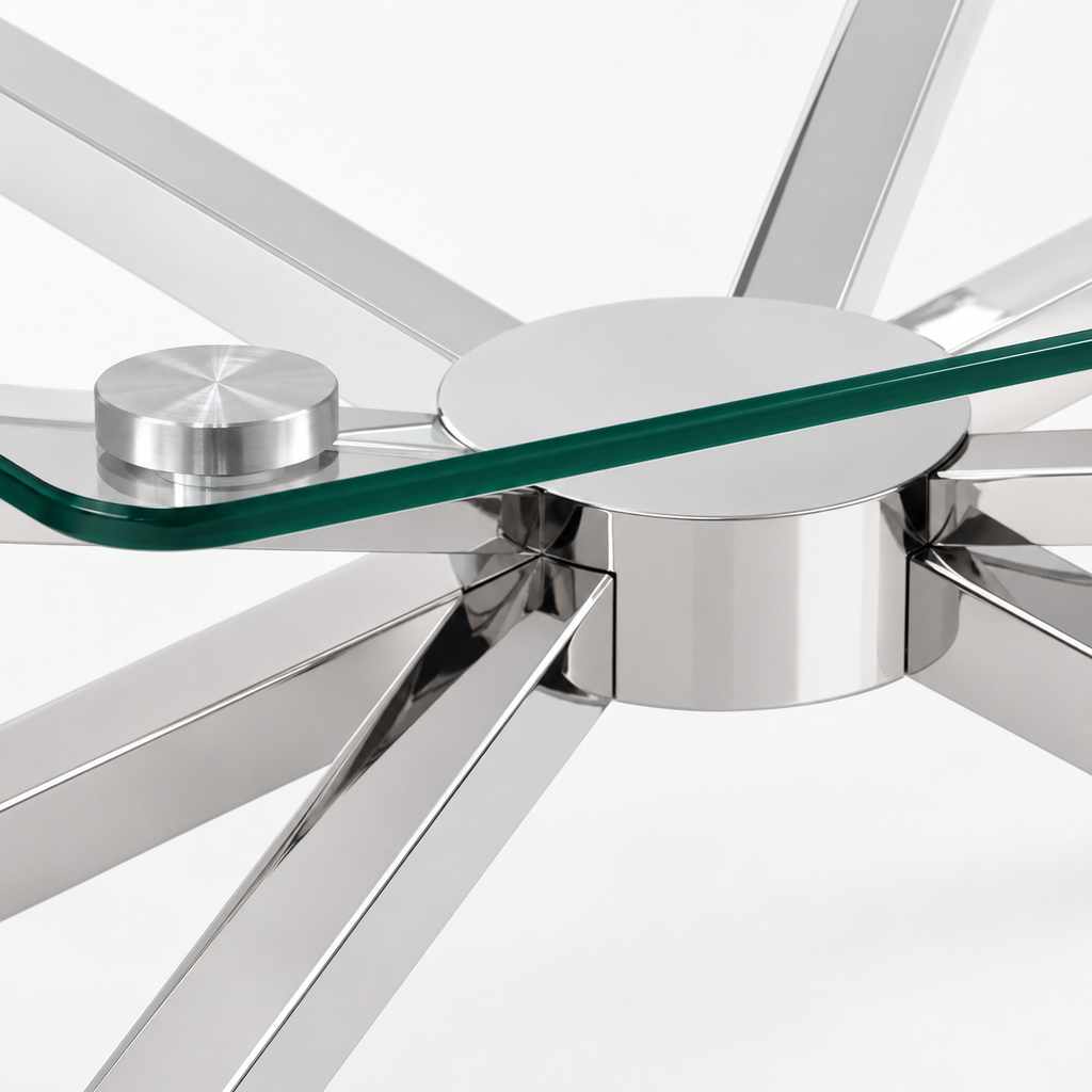 Polished chrome starburst hub close-up glass edge stainless steel coffee table