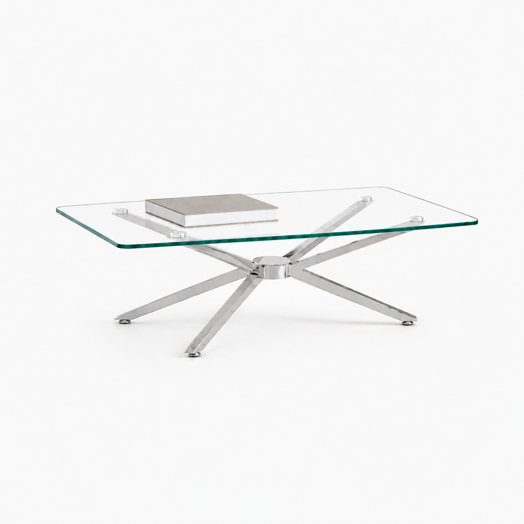 Rectangular glass coffee table polished chrome starburst base styled with art book