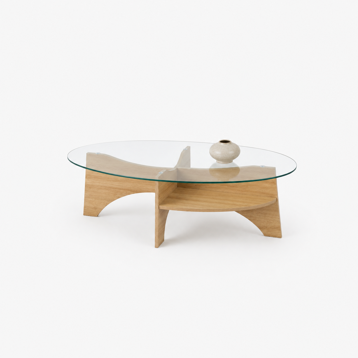 Oval glass coffee table with sculptural natural oak base in modern living room